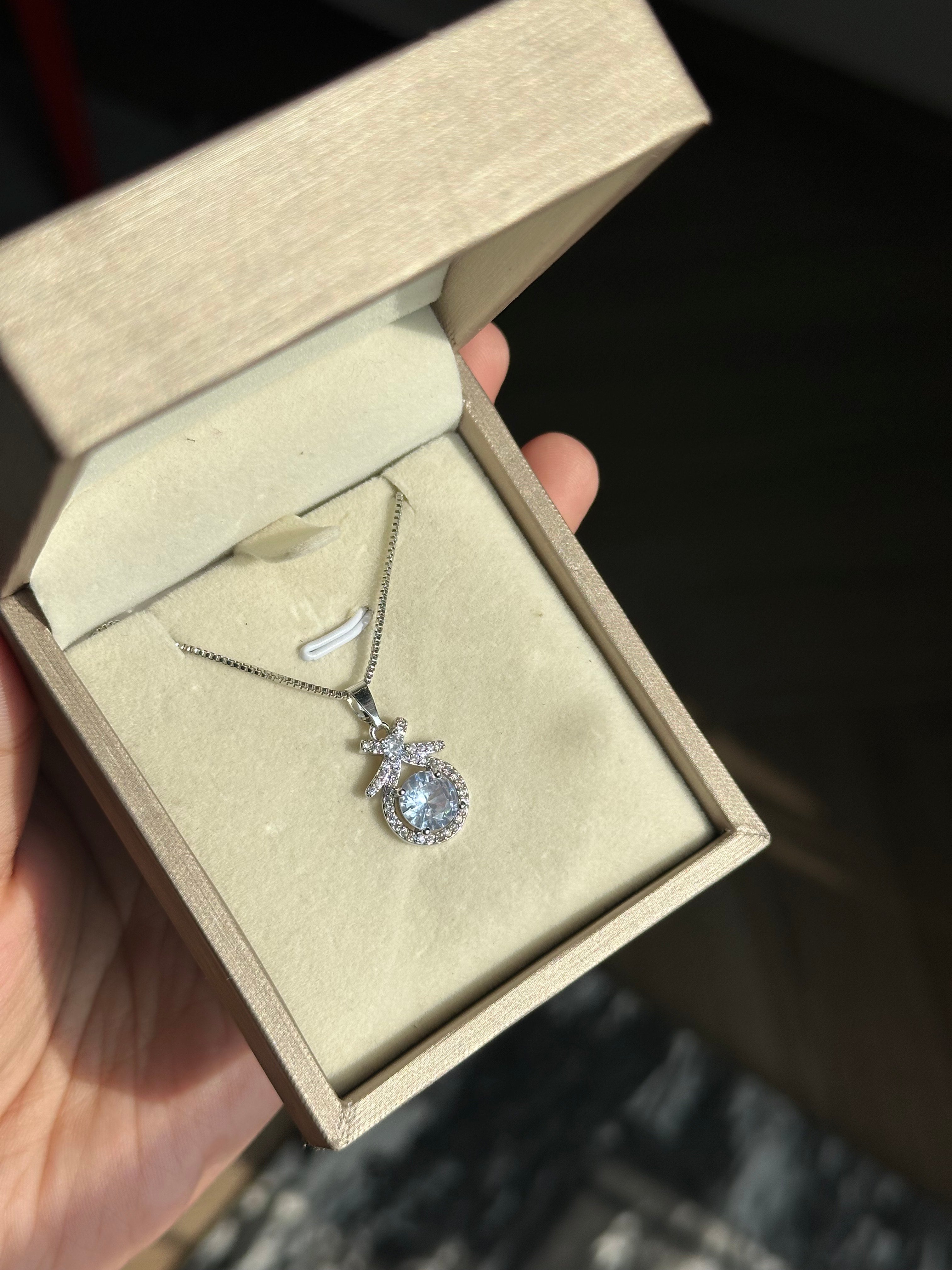 White Stone Bow Pendent